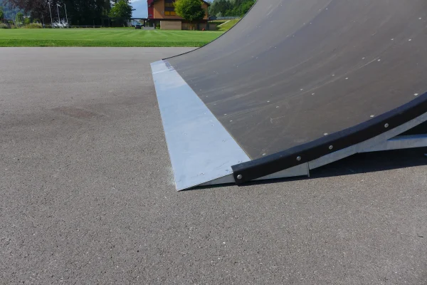 Detail of a quarter pipe transition at the Ruggell Street Skatepark.
